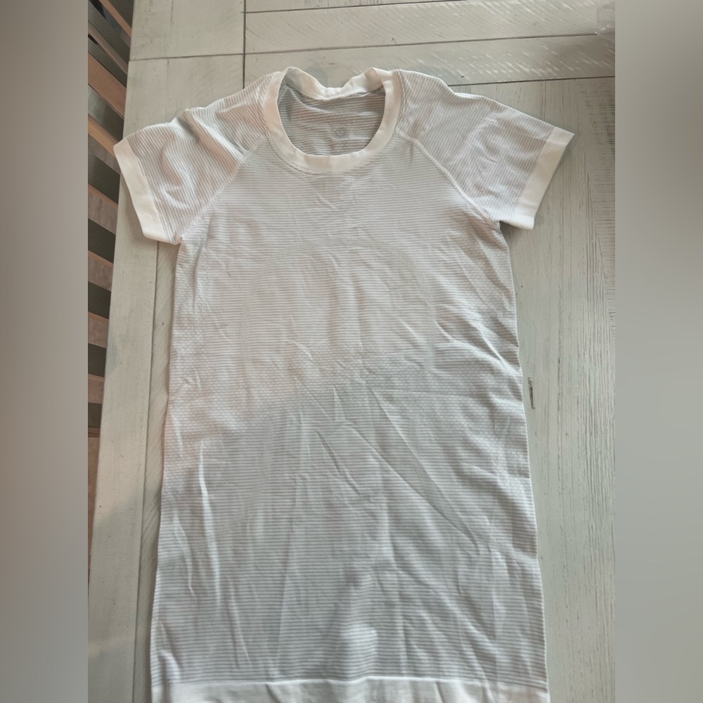 Lulu Lemon White Striped Short Sleeve top. Excellent condition